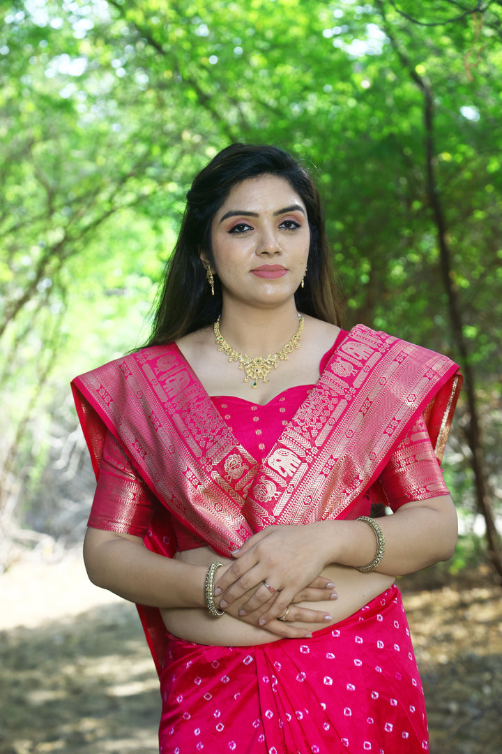 Vibrant orange handmade Bandhej Kanjivaram silk saree with stunning border and pallu, perfect for festive celebrations.