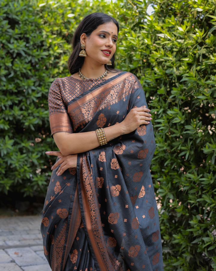 Stunning black soft silk saree with intricate weaving and a richly designed pallu, ideal for weddings and special gatherings.