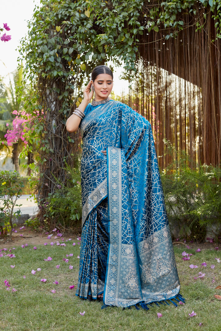 Elegant rani-red Kanjivaram soft satin silk saree with intricate weaving and butta design, perfect for special events.