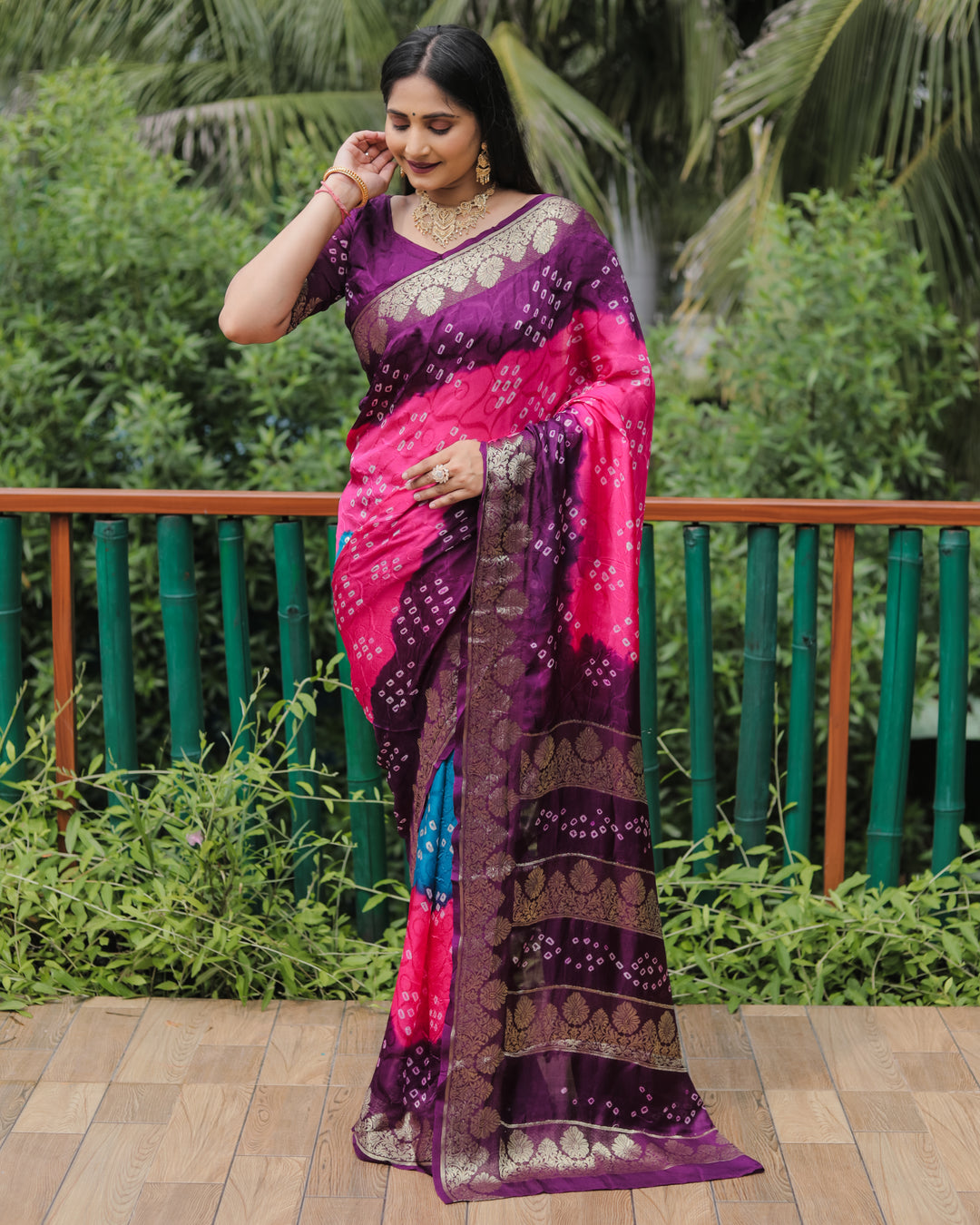 Pink Pure Bandhej Silk Saree with exquisite weaving and designer zari border, perfect for celebrations.