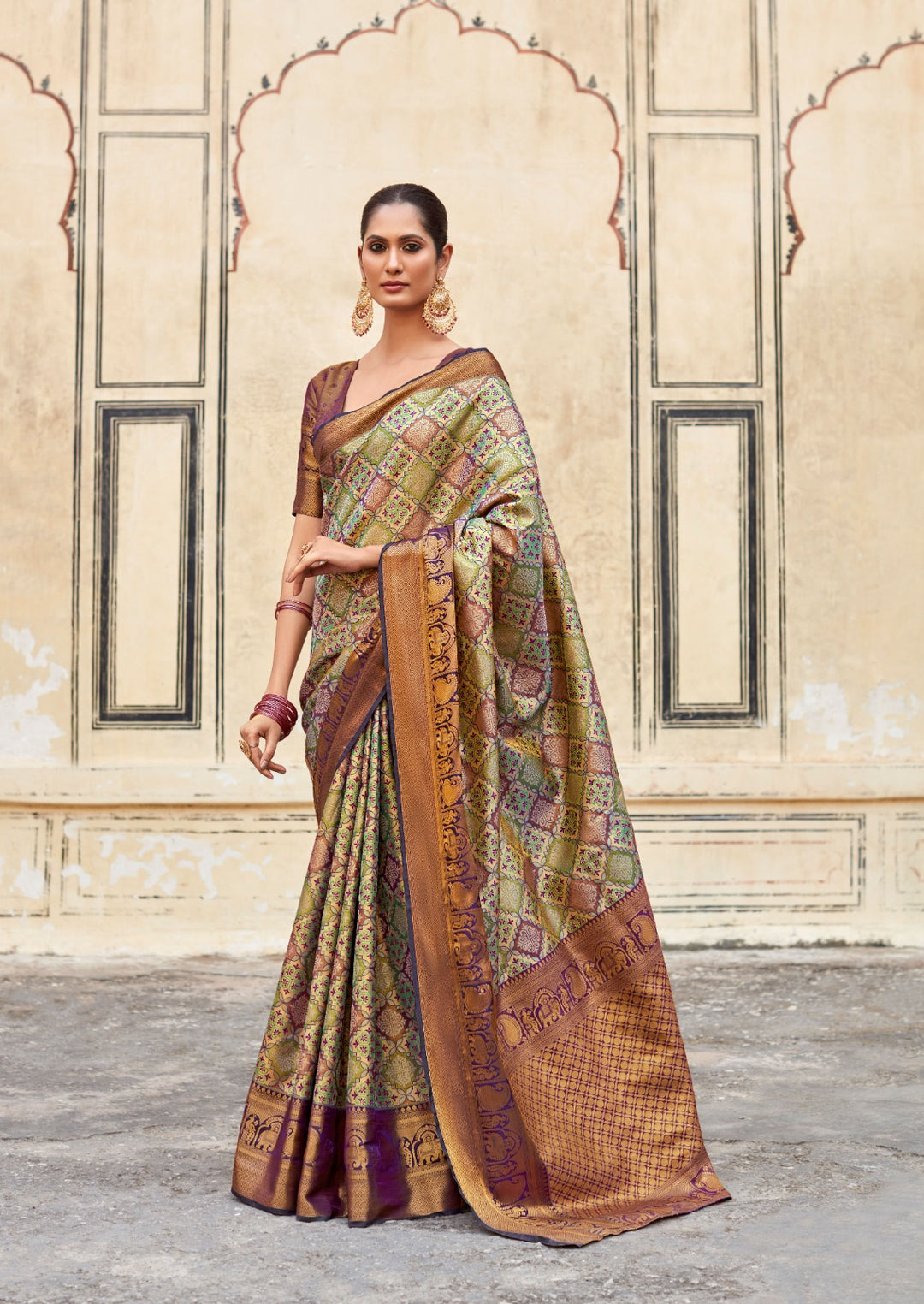 Festive saree with traditional handloom artistry and intricate zari designs