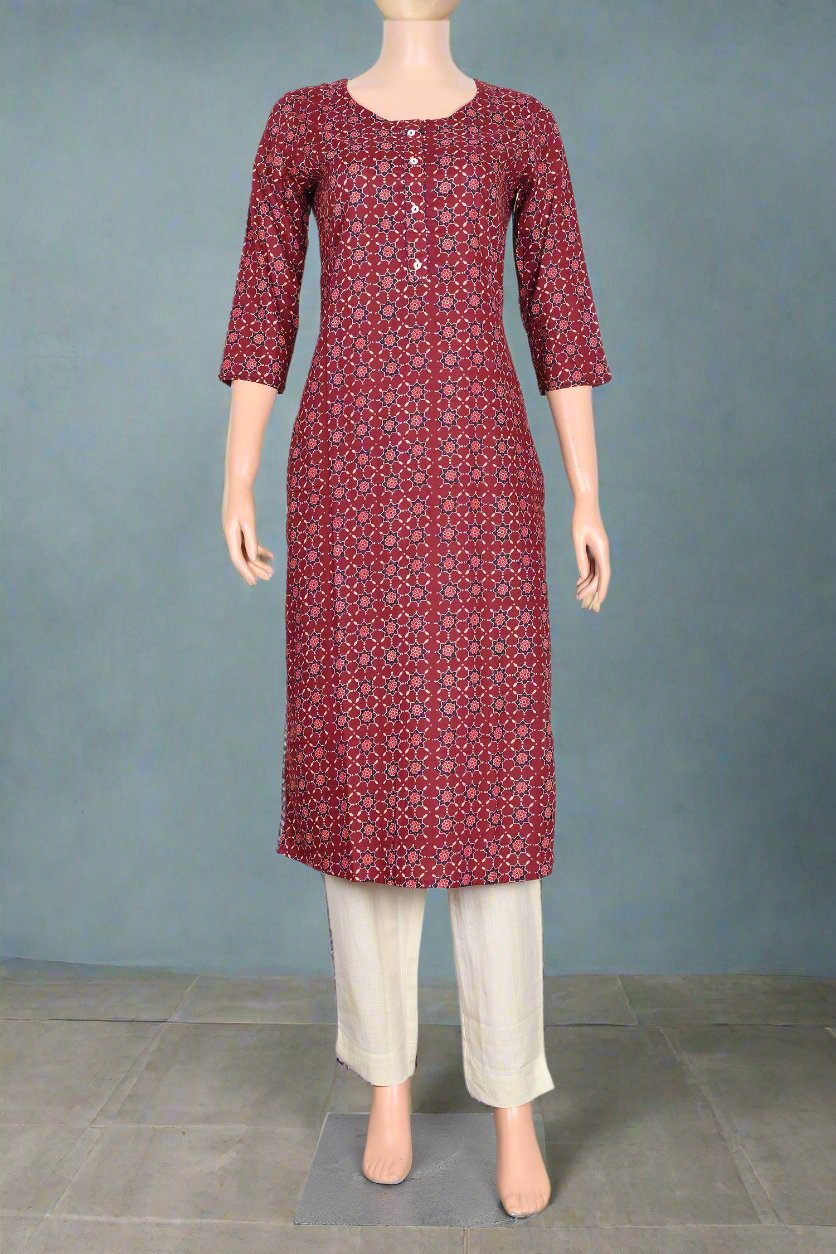 Elegant dark maroon cotton kurti with floral design, ideal for women’s casual wear.