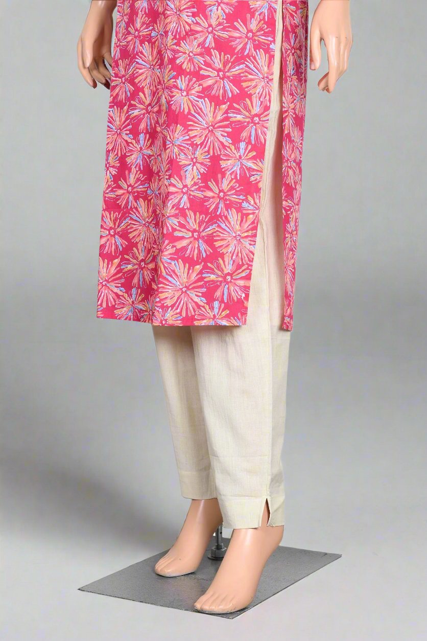 Trendy women’s kurta in vibrant pink with beautiful floral design, perfect for everyday wear and casual gatherings.