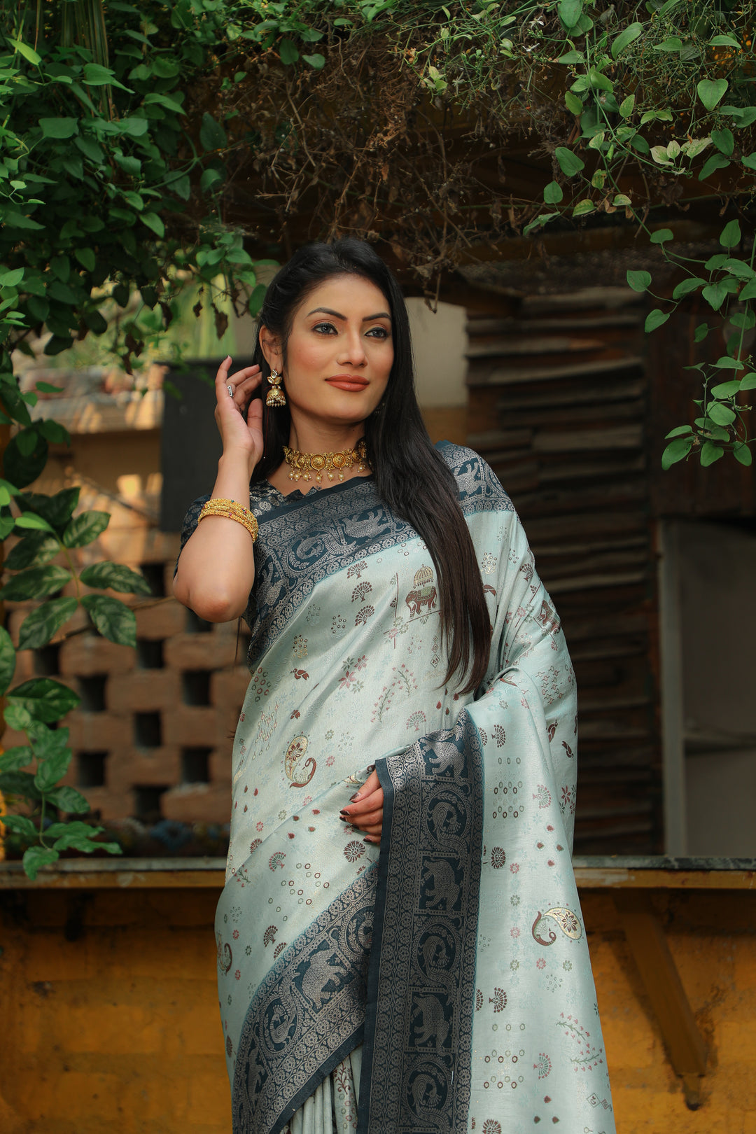 Stunning light-mint-green Kanjivaram silk saree featuring beautiful weaving and traditional borders, ideal for weddings.