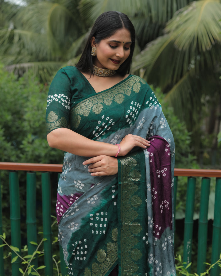 Luxurious Purple Bandhej Silk Saree with designer zari border and beautifully woven pallu.