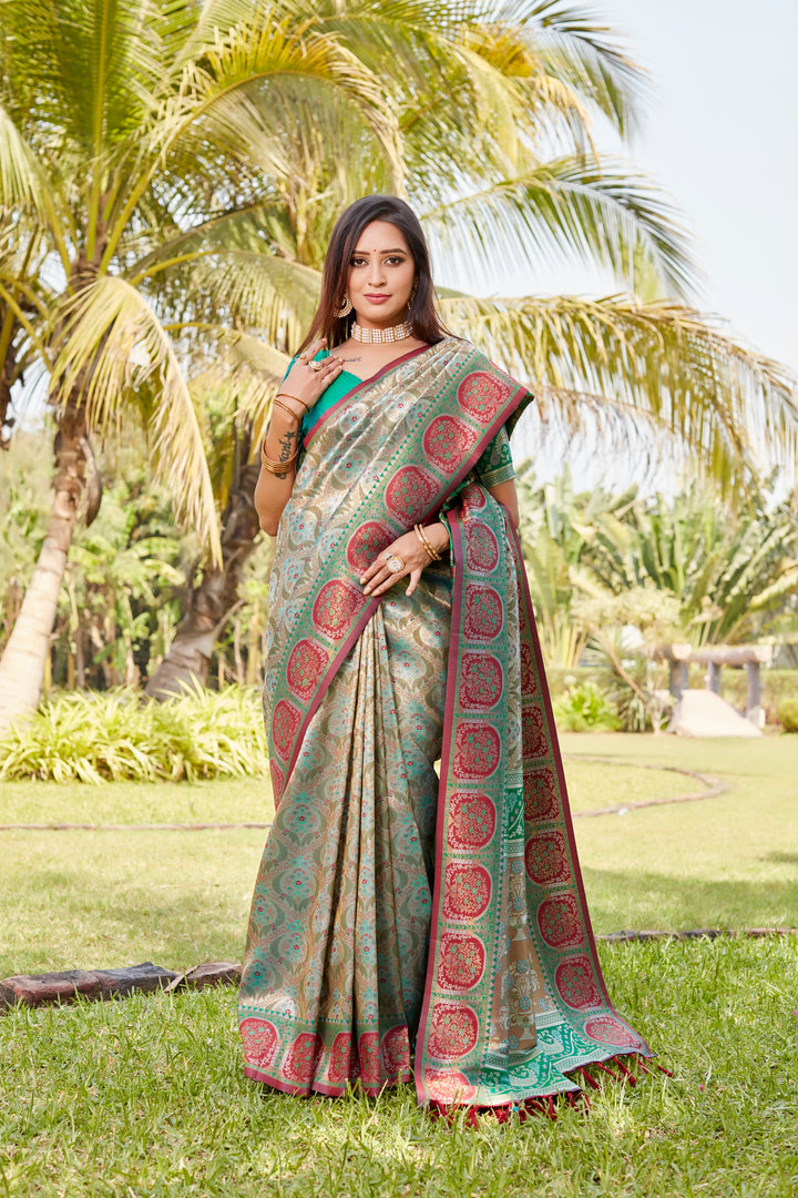 Stunning green Kanjivaram soft silk saree with rich pallu and intricate design for grand occasions.