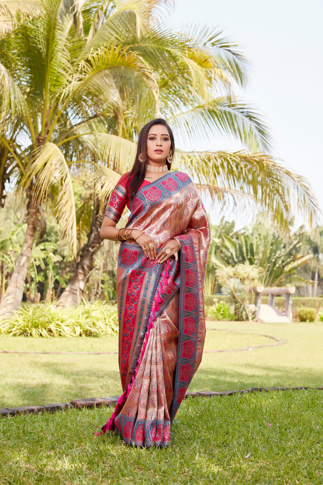 Exquisite bright pink Kanjivaram silk saree with intricate embroidery and a woven pallu, designed to make a statement.