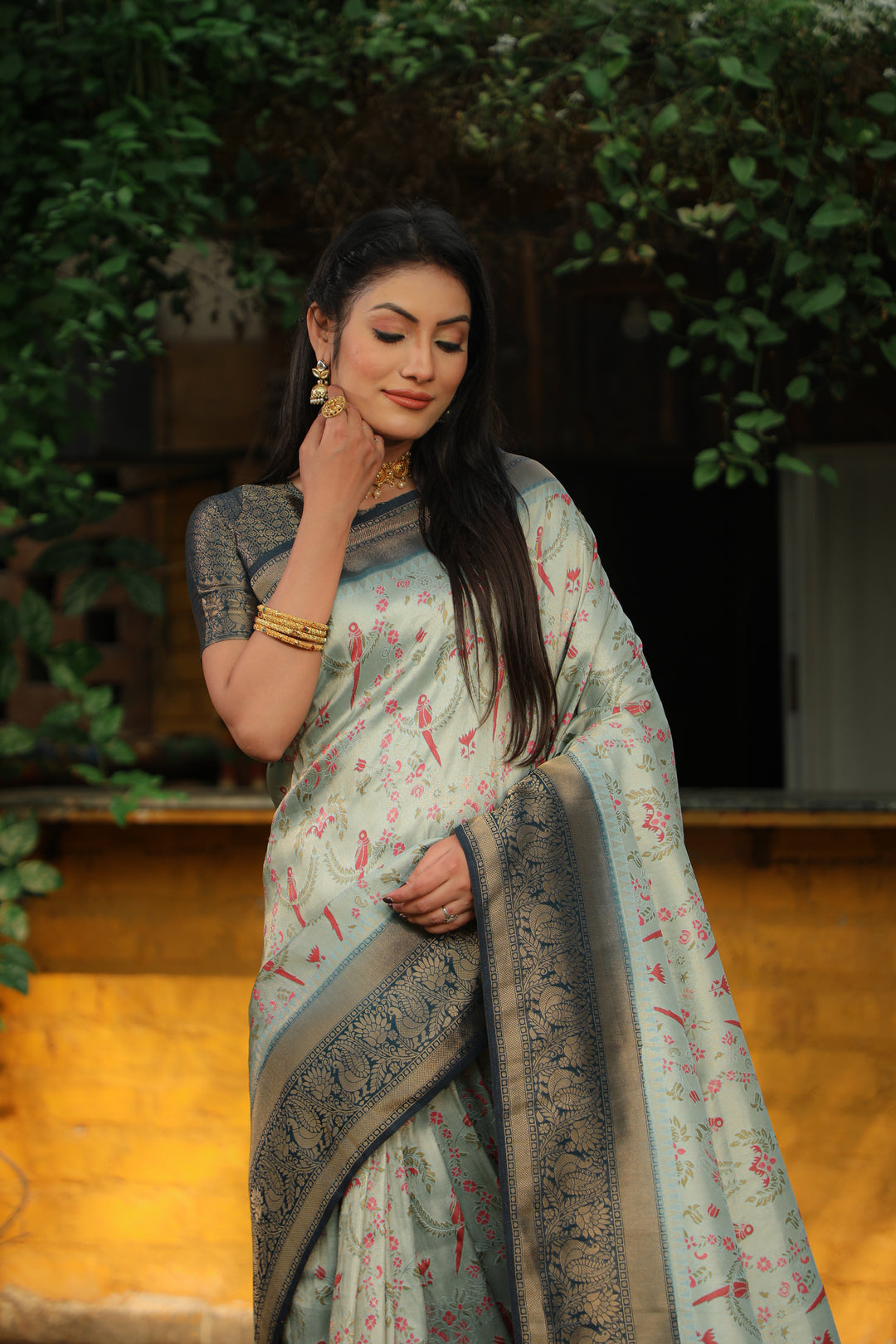 Beautiful Kanjivaram saree in Grey, featuring intricate borders and shine, perfect for festive gatherings.