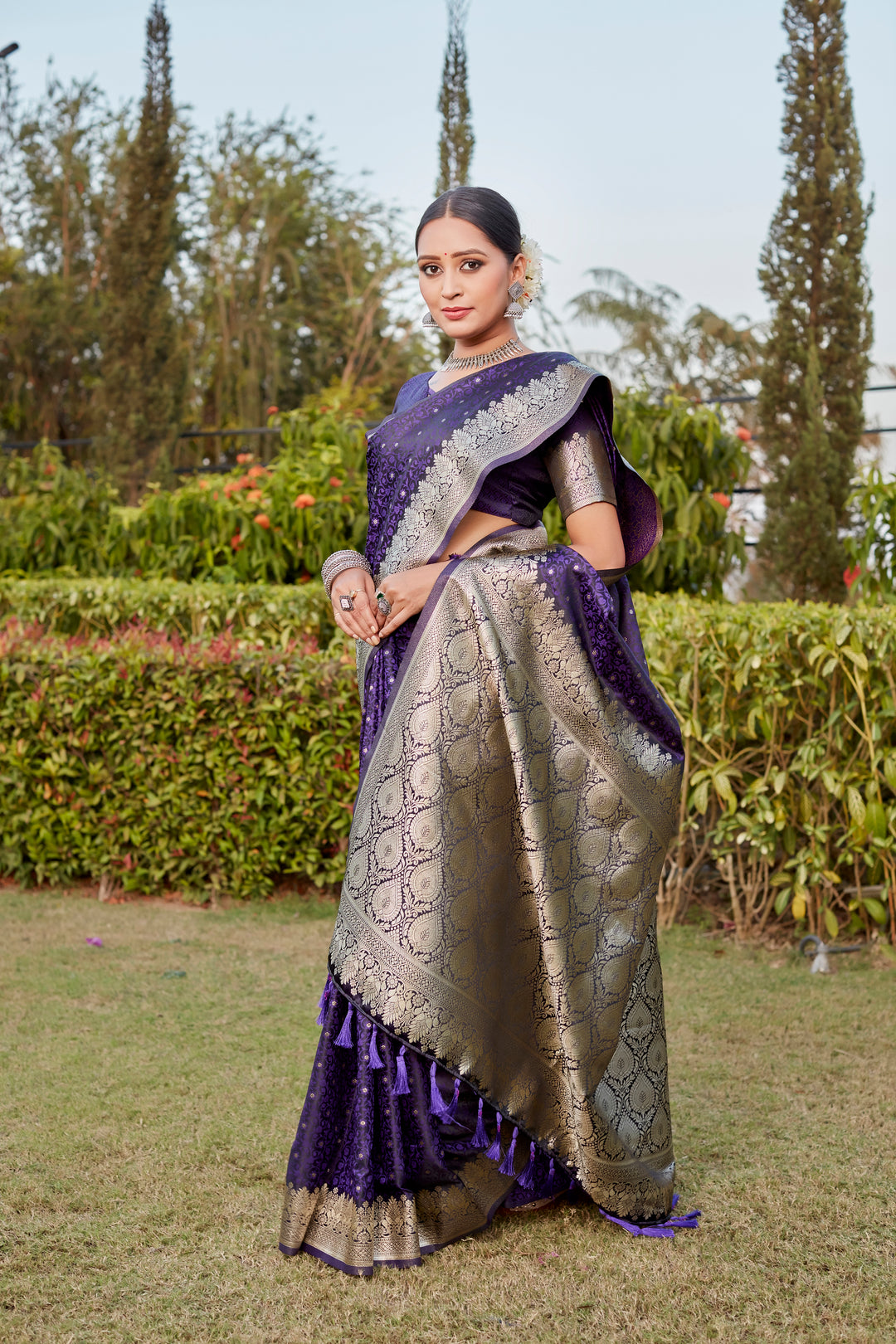 Elegant Purple Kanjivaram Satin Silk Saree with intricate Butta patterns and beautiful designer border.