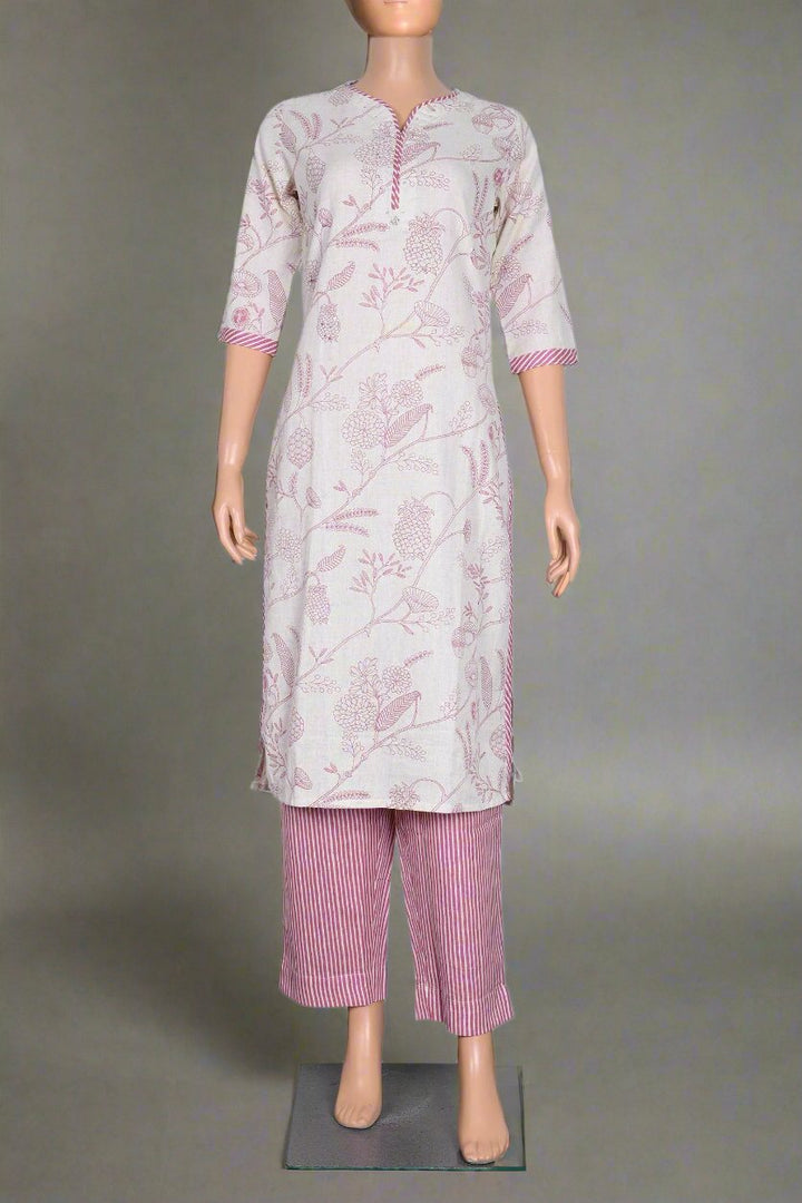 Chic white and pink floral kurti set designed for women, offering a blend of comfort and style for everyday wear