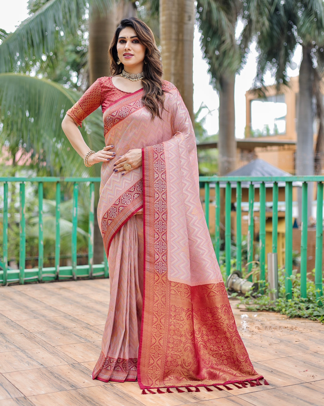 Stunning Pink Pure Kanjivaram Saree with Leheriya pattern and exquisite heavy border.