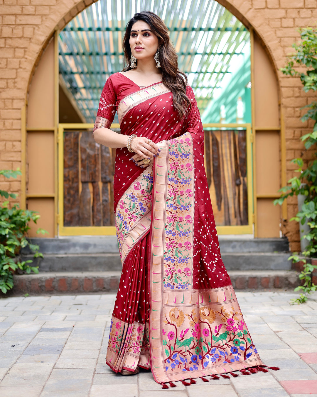 Maroon Bandhej Paithani silk saree with rich zari weaving and Paithani border, adding a touch of luxury to your wardrobe.