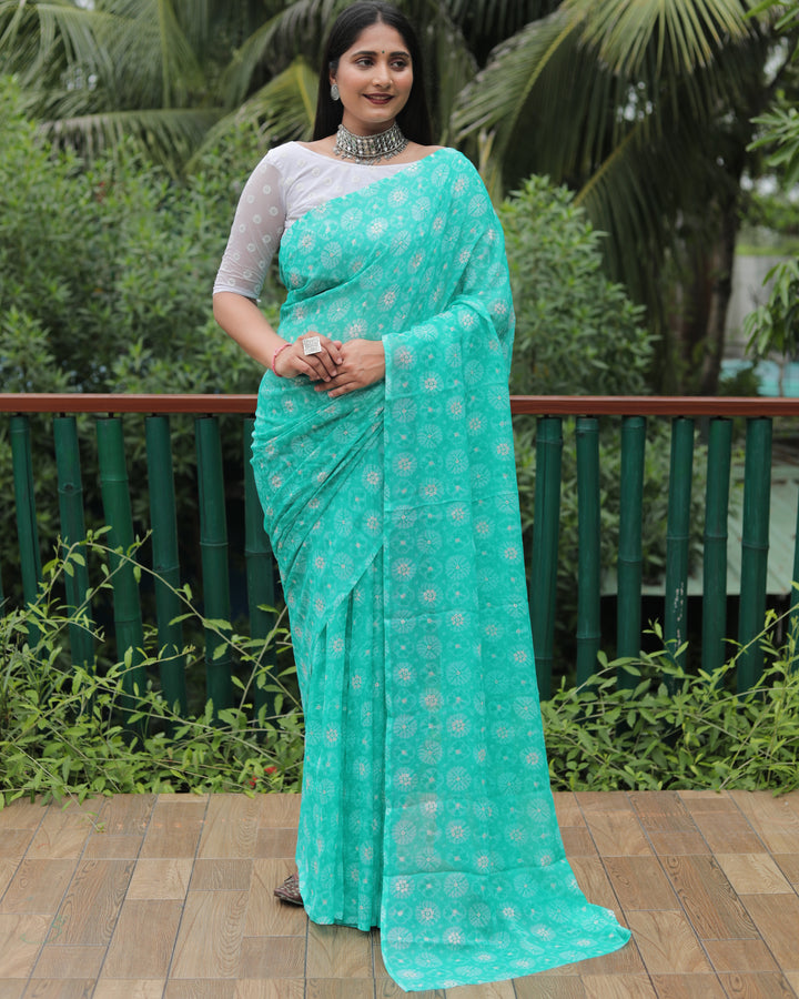 Beautiful sea blue chiffon saree with foil detailing, offering elegance and style for any event.