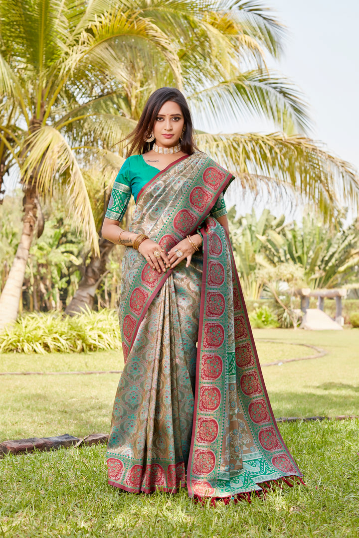 Timeless teal Kanjivaram soft silk saree with intricate work and rich pallu for weddings.