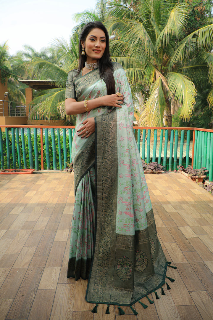 Refreshing pista-green Kanjivaram soft silk saree with heavy blouse, ideal for weddings and festive events.