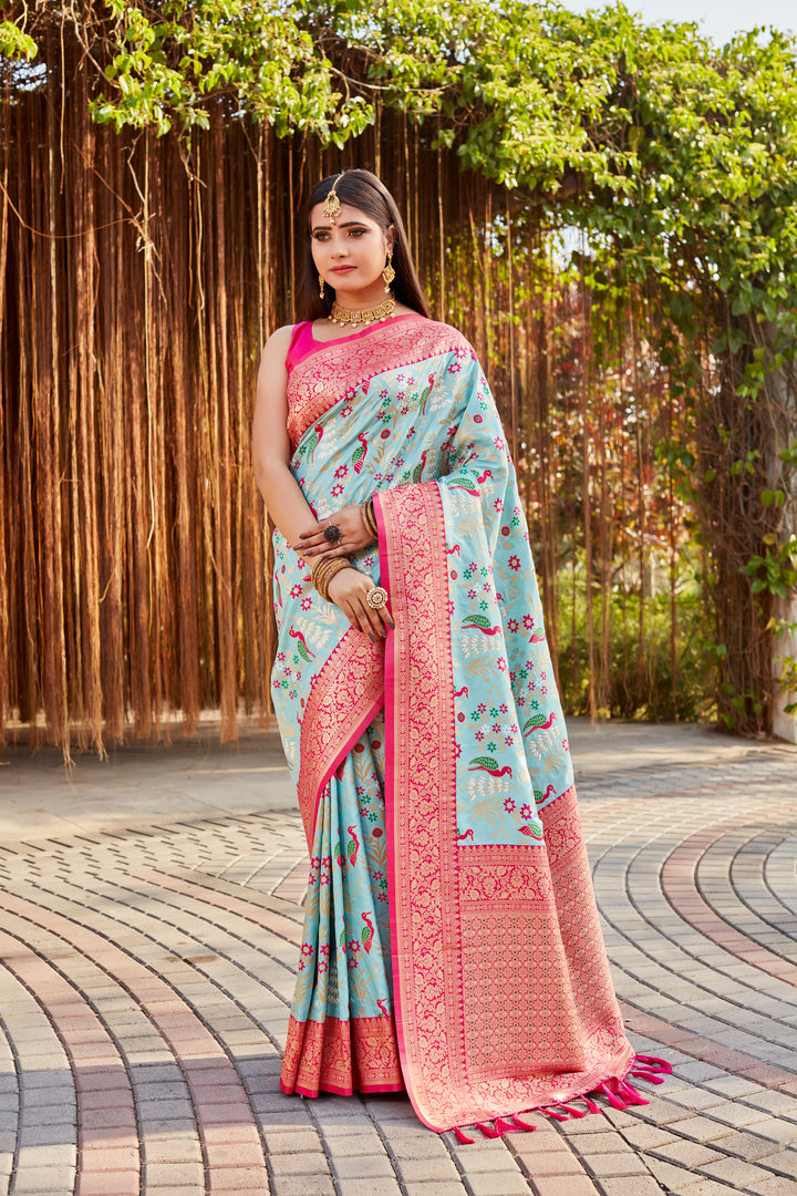 Premium Off-White Kanjivaram Silk Saree with intricate traditional borders for festive wear.