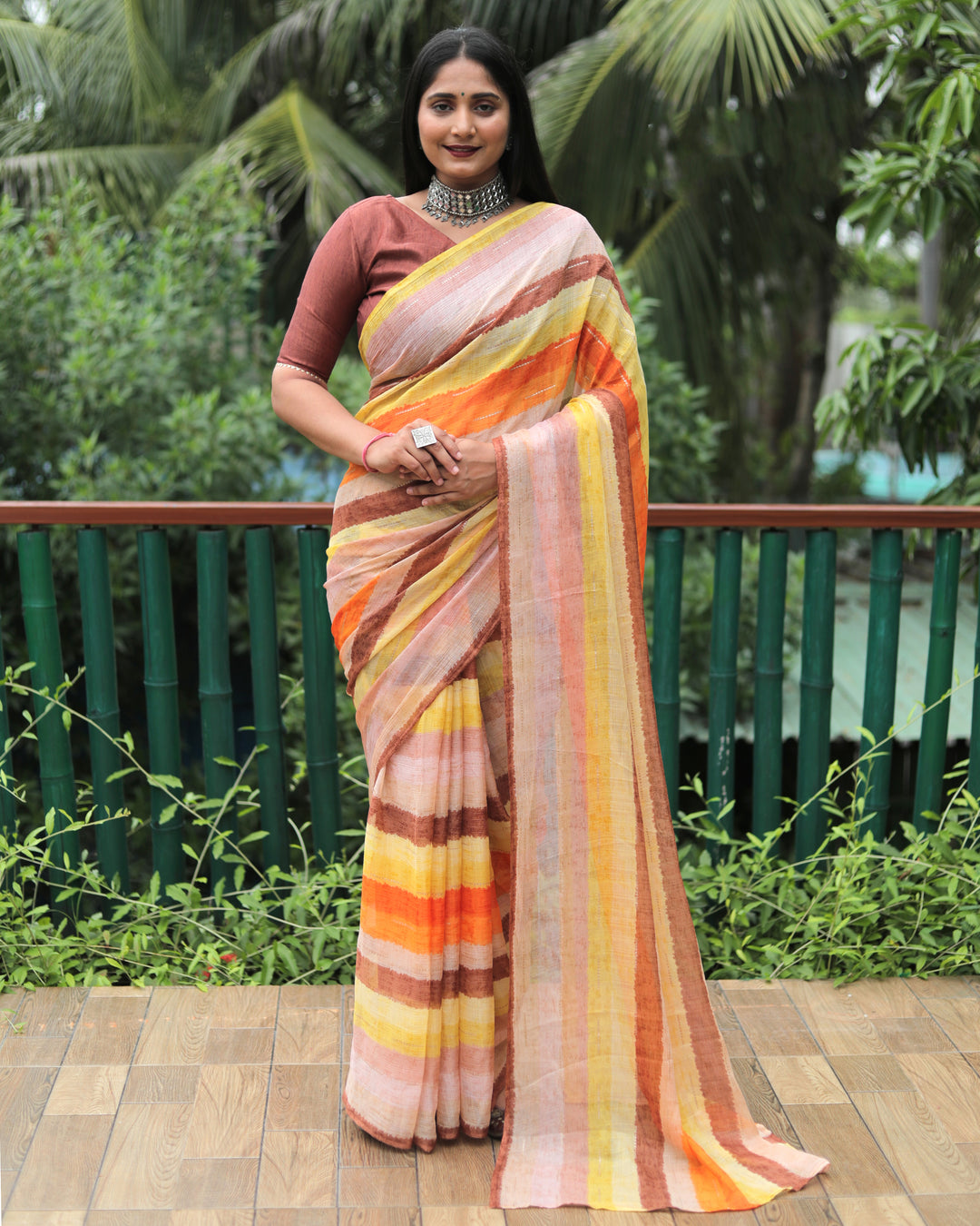 Add a burst of color to your wardrobe with this multicolor Moss chiffon saree, enhanced by a striking gold foil design for a glamorous look.