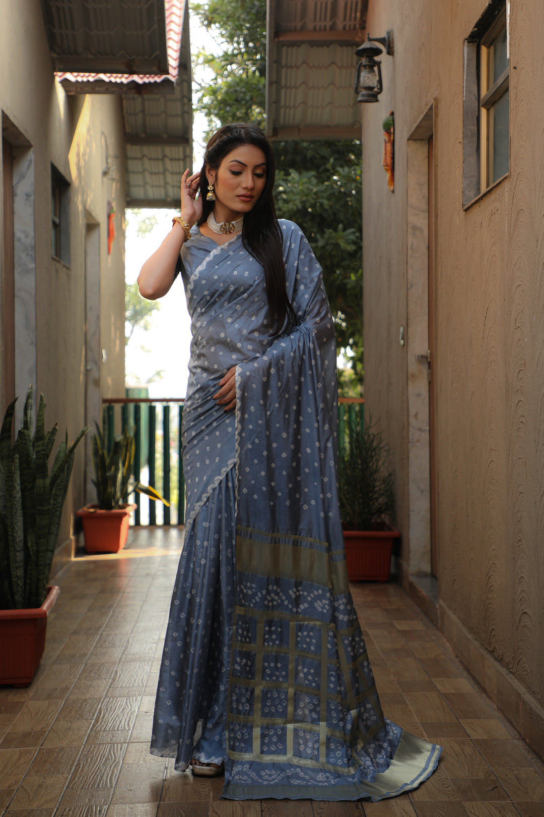 Stunning grey Bandhej silk saree with intricate checks pattern, ideal for weddings.