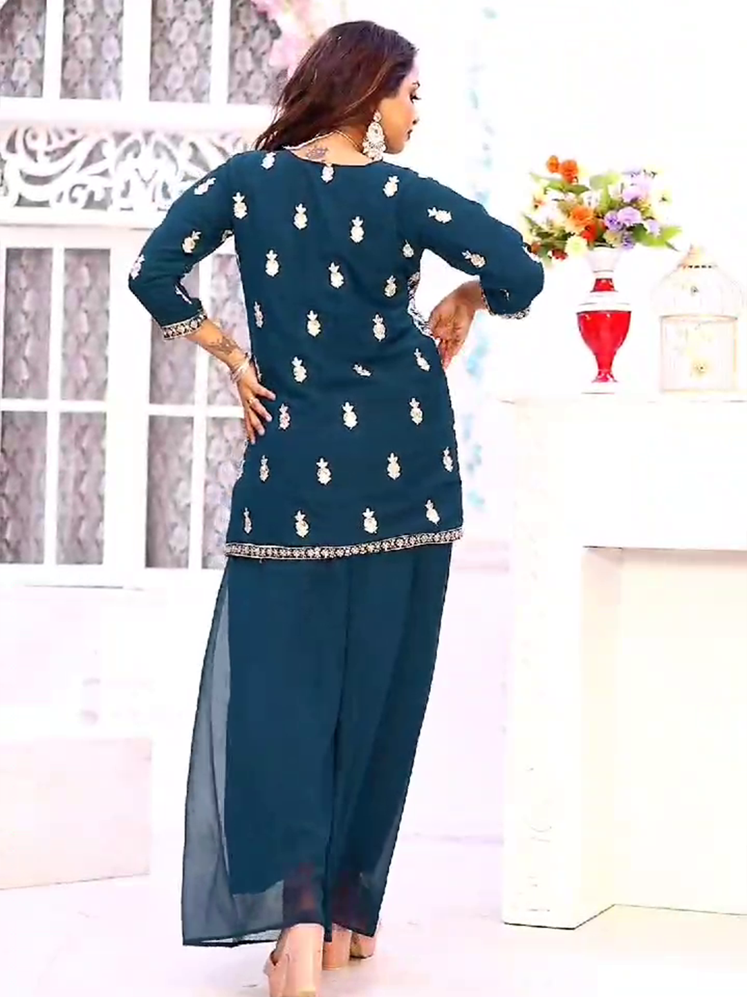 Deep sea blue georgette palazzo set, tailored for modern style and comfort at casual gatherings.