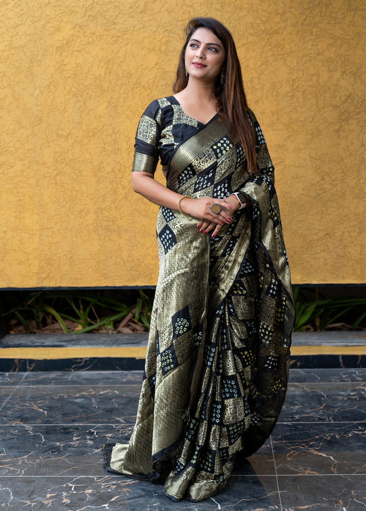 Elegant wine Bandhej silk saree featuring a delicate zari border, perfect for cultural gatherings and weddings.