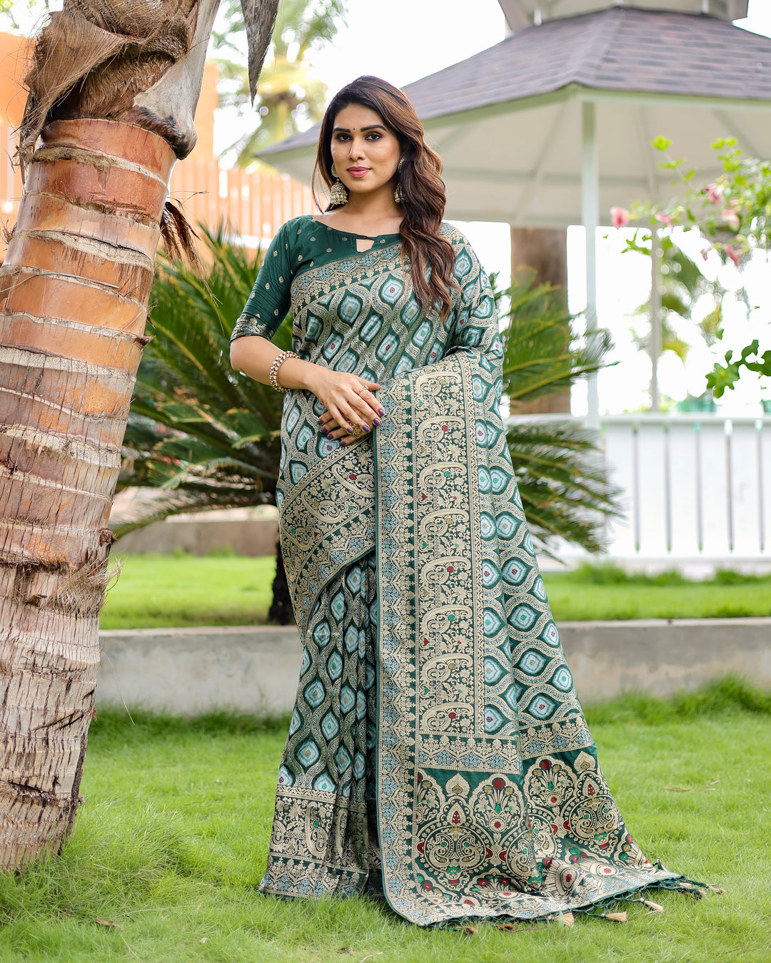 Classic green Kanjivaram Pattu Silk Saree with fine zari embroidery and embossed texture, ideal for USA brides.