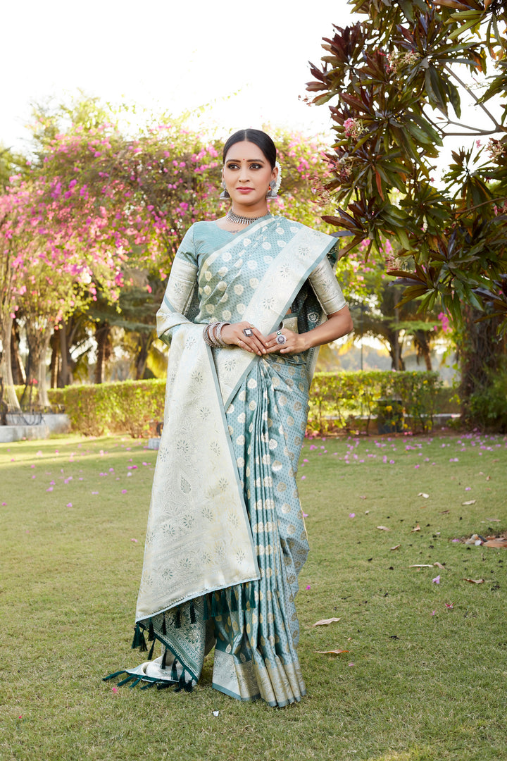 Sky blue Kanjivaram Soft Satin Silk saree with intricate butta work all over, paired with a rich satin border to enhance your look.