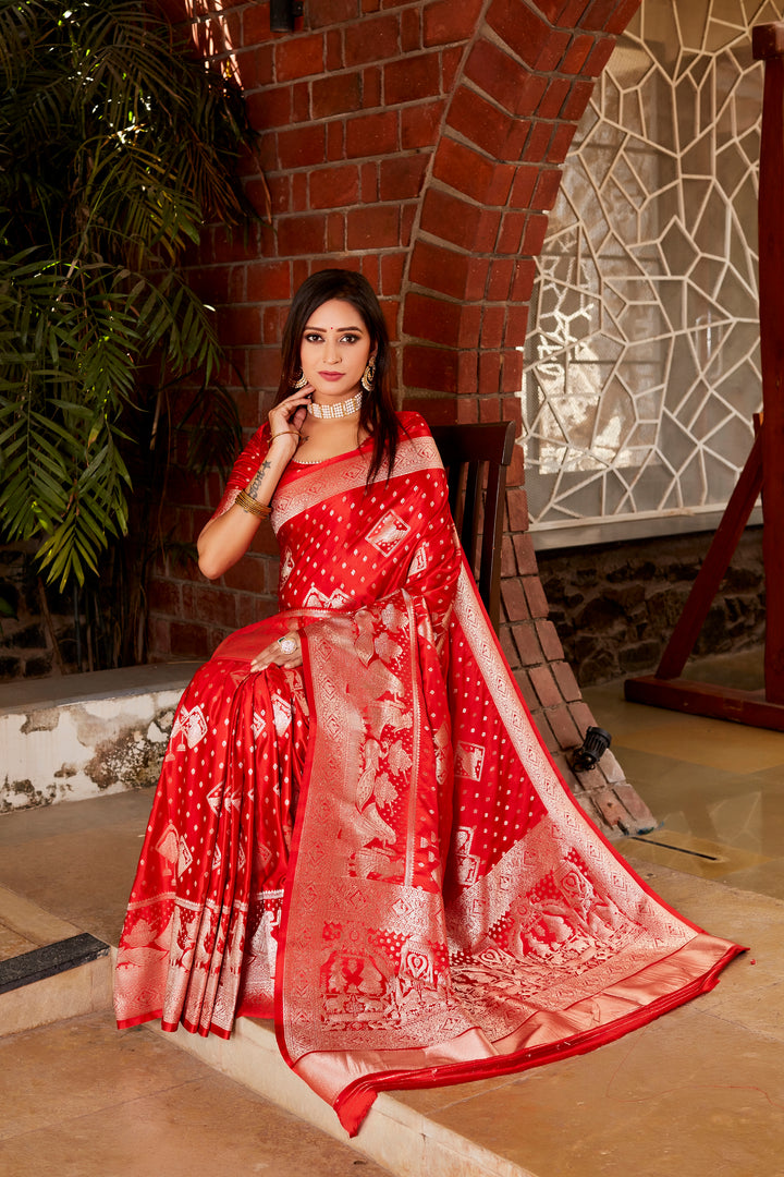 Elegant red Kanjivaram silk saree with delicate detailing and a matching satin border, perfect for weddings and cultural events.