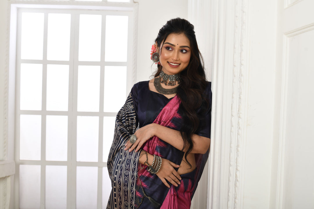 Beautiful Tussar silk saree with printed temple border and traditional fabric pattern for festive occasions.