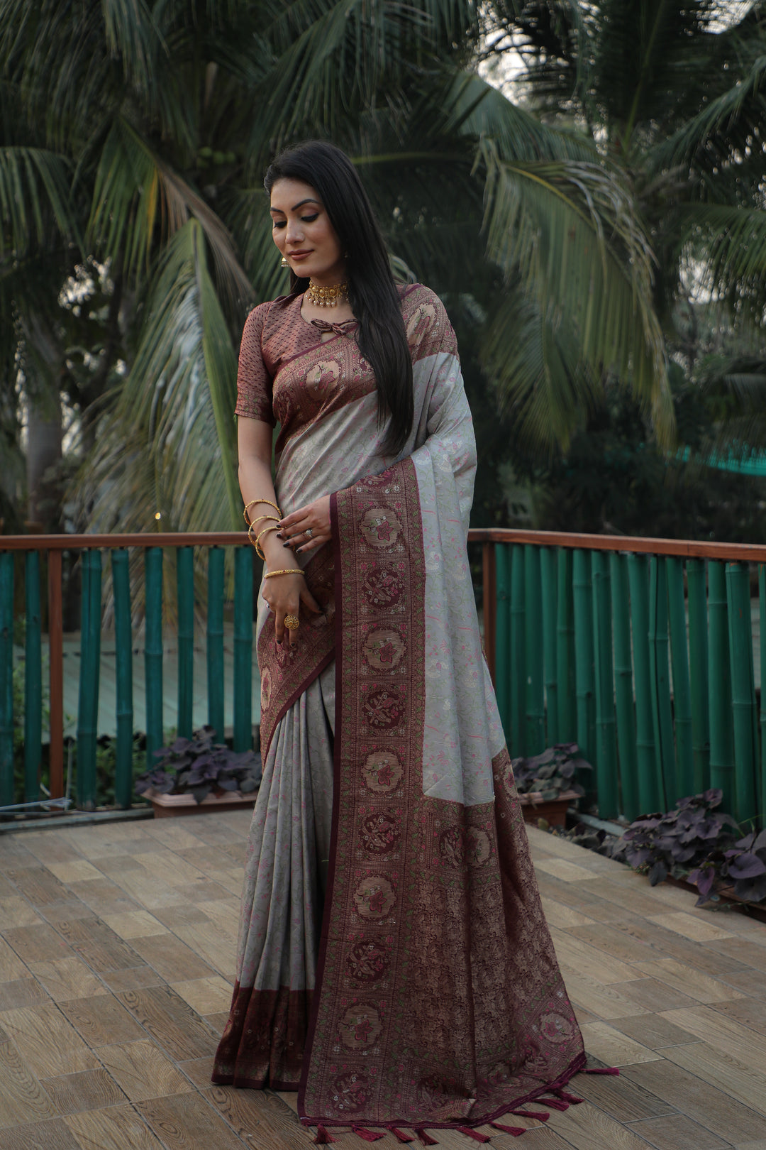 Timeless grey Kanjivaram saree with intricate weaving and delicate borders, ideal for cultural events and special gatherings.