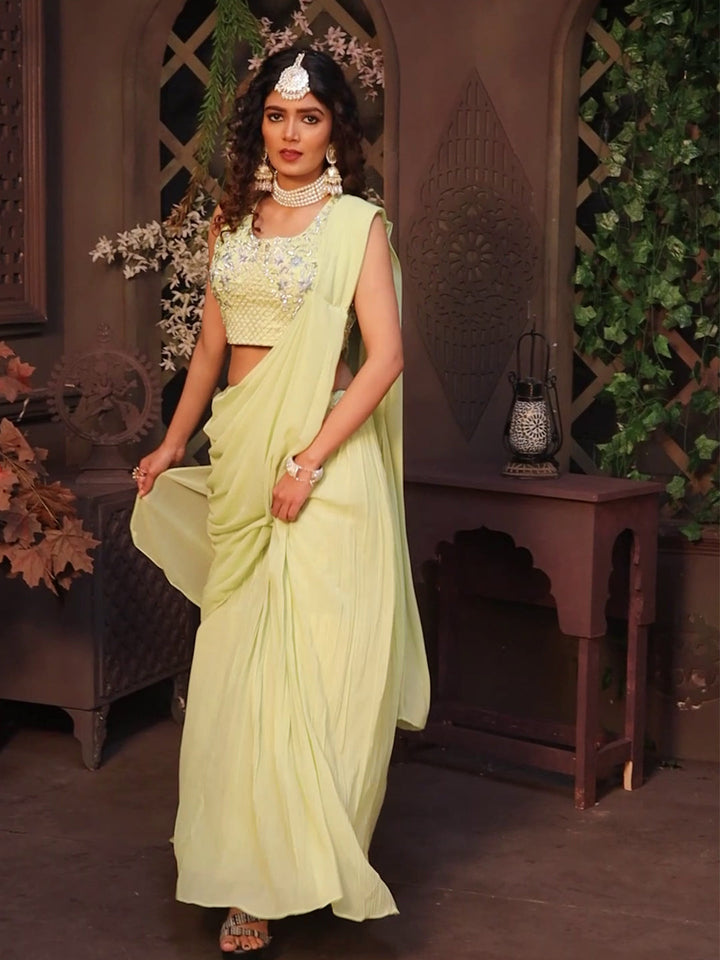 Pista green floral crop top and skirt lehenga set made from georgette fabric, perfect for festive occasions.