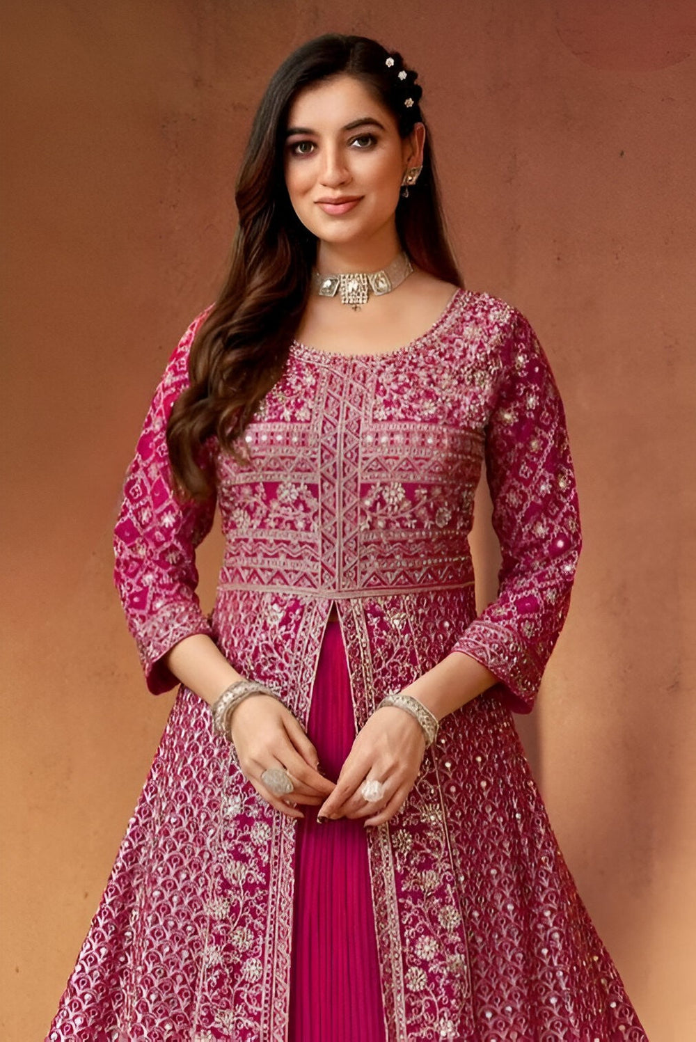 Stylish pink skirt lehenga with a peplum top, designed for women’s fashion.