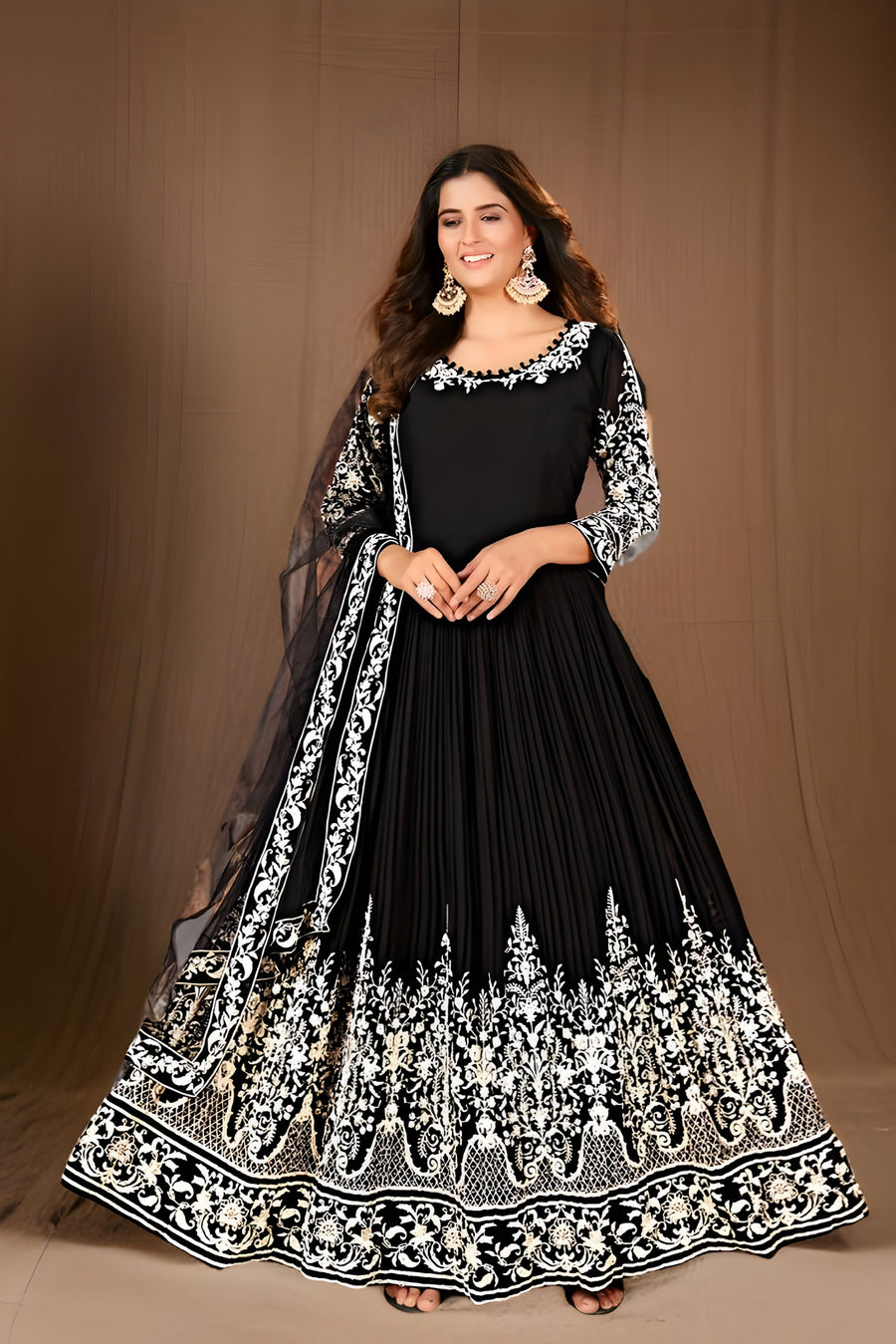 Stylish black gown dress made from premium georgette featuring a pleated design.