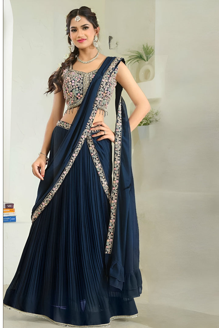 Navy blue buttercup draped georgette saree featuring a hand-painted floral design, perfect for elegant occasions.