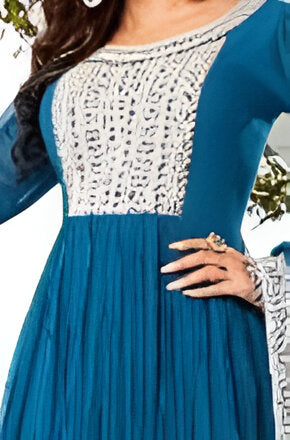 Elegant blue Anarkali gown, perfect for festive celebrations and gatherings.