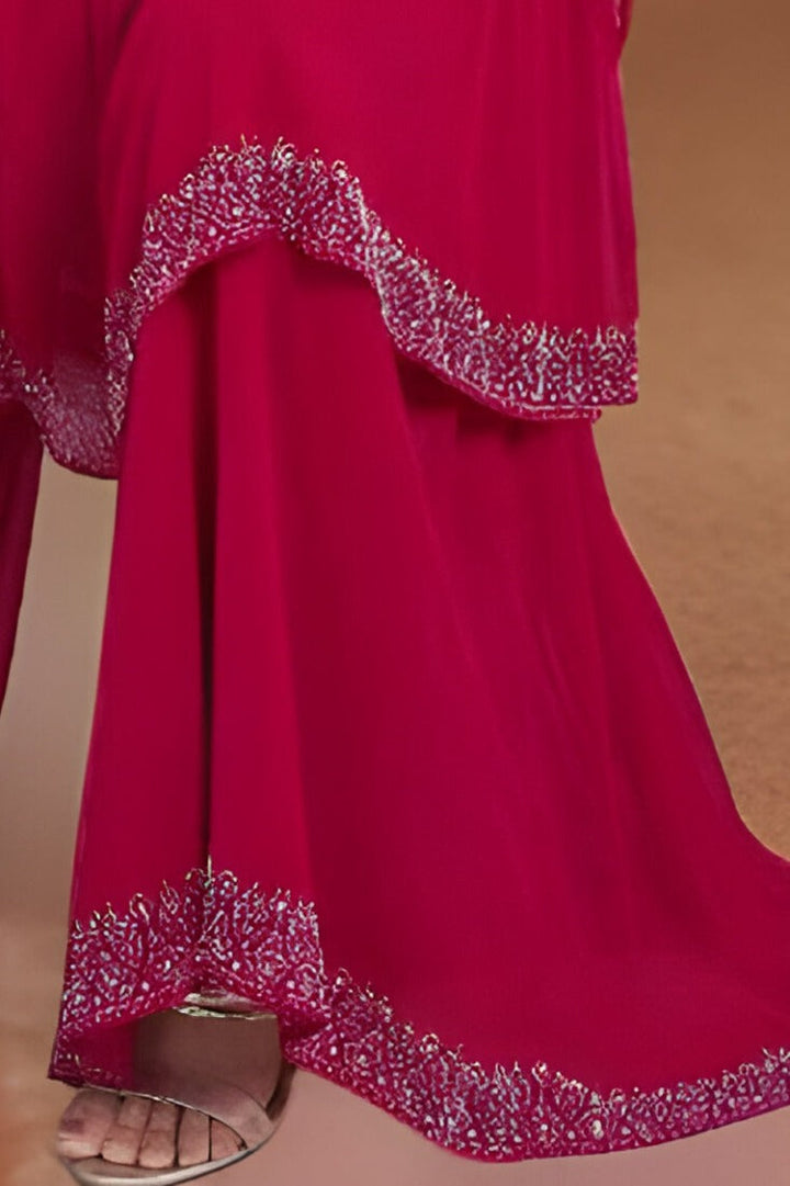 Gorgeous pink kurti and dupatta garara set, perfect for traditional wear.