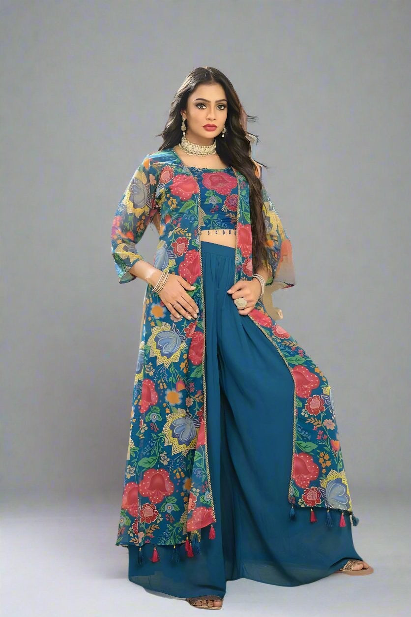 Stylish blue floral georgette palazzo suit featuring a sheer tunic, perfect for elegant gatherings and celebrations.