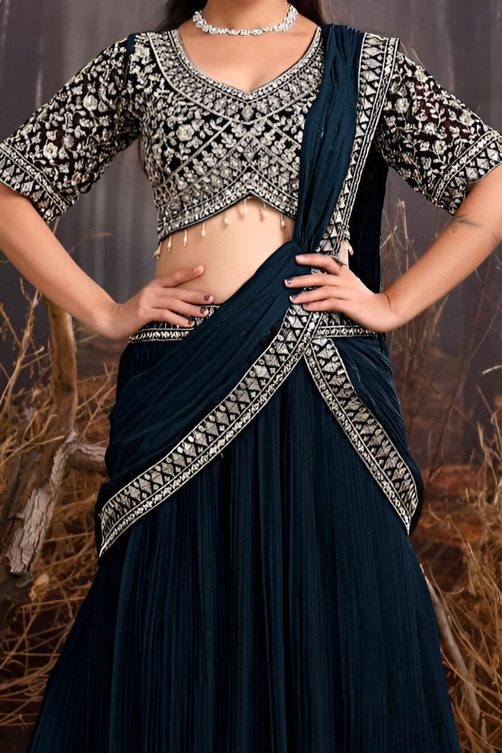 Elegant navy blue saree designed for weddings and parties.