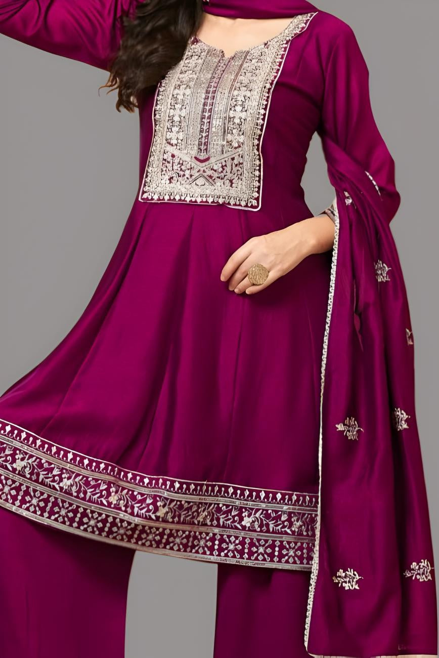 Gorgeous silk garara suit crafted for traditional celebrations.