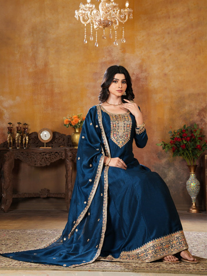 Elegant Vichitra silk ball gown in deep blue, designed with a front slit for style.