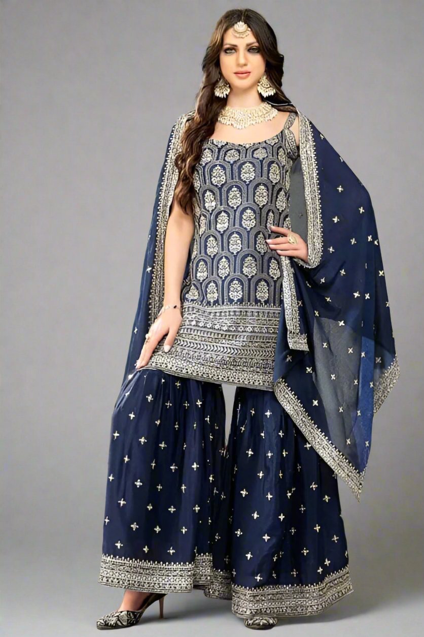 Festive blue garara suit featuring a georgette kurti and matching dupatta, perfect for celebrations.