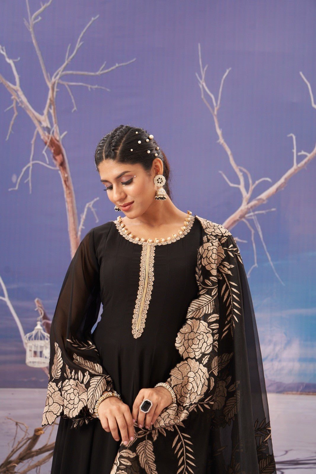 Gorgeous black gown crafted from georgette, designed for women’s fashion.