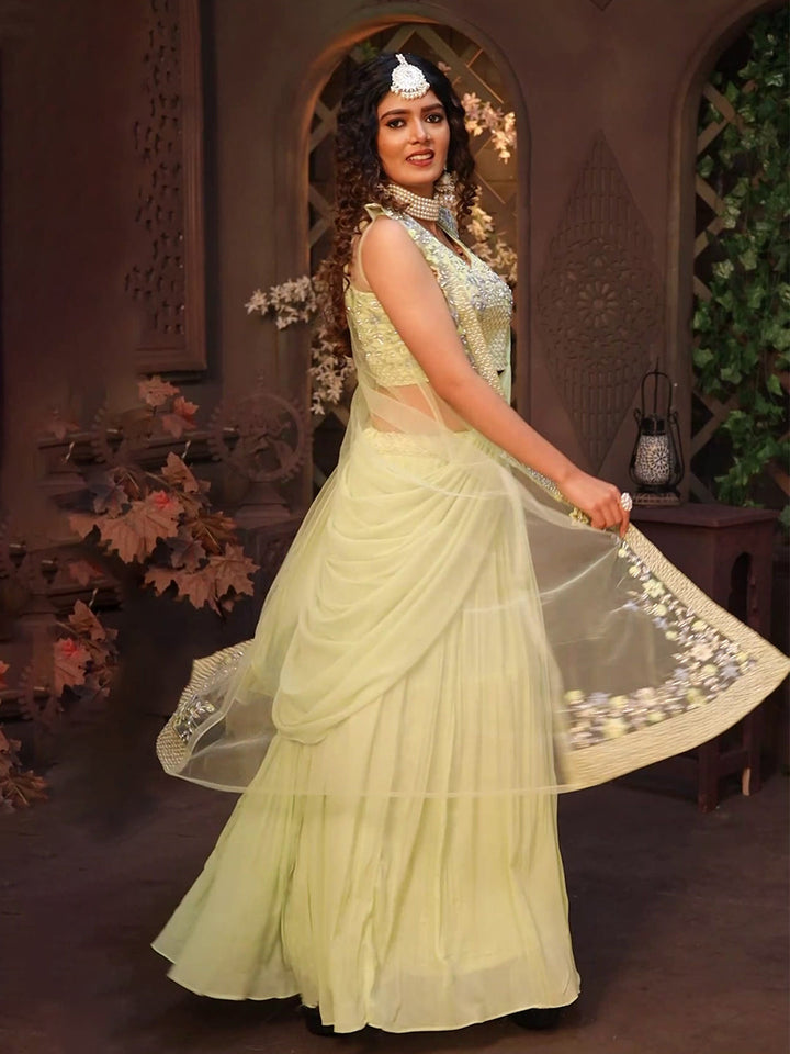 Gorgeous georgette lehenga set in pista green, ideal for celebrations.