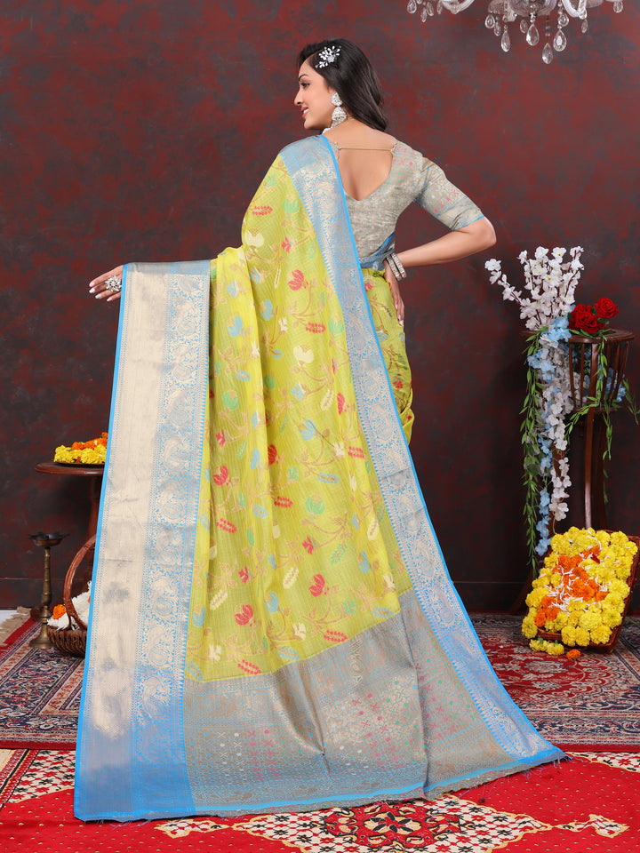 Soft yellow cotton saree with Meenakari details and silk blouse, ideal for cultural events.