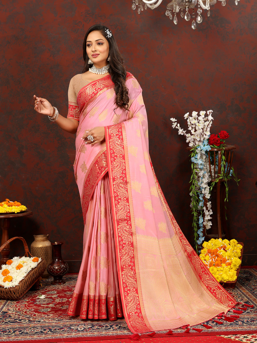 Designer pink cotton saree featuring rich zari pallu, ideal for traditional gatherings.