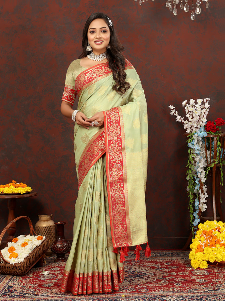 Charming pista green cotton saree with zari pallu and silk blouse piece, ideal for formal gatherings.