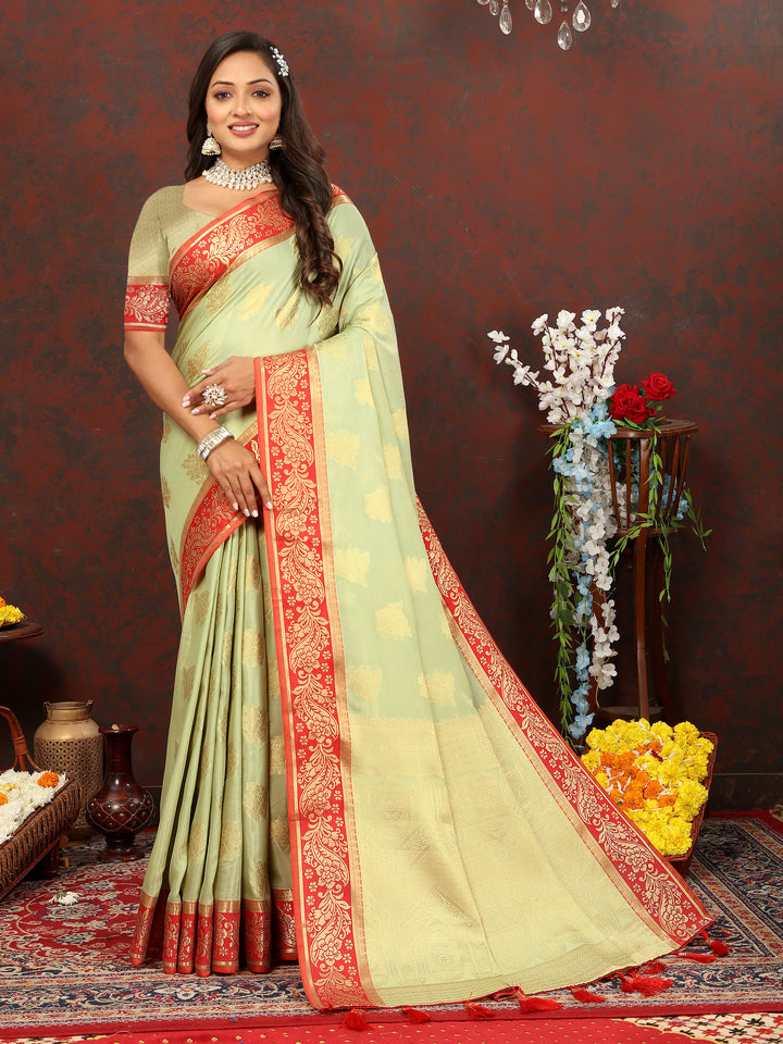 Pista green designer cotton saree with luxurious zari pallu, perfect for festivals.