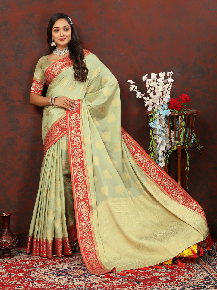 Elegant pista green cotton saree with detailed zari pallu and silk blouse, ideal for cultural events.