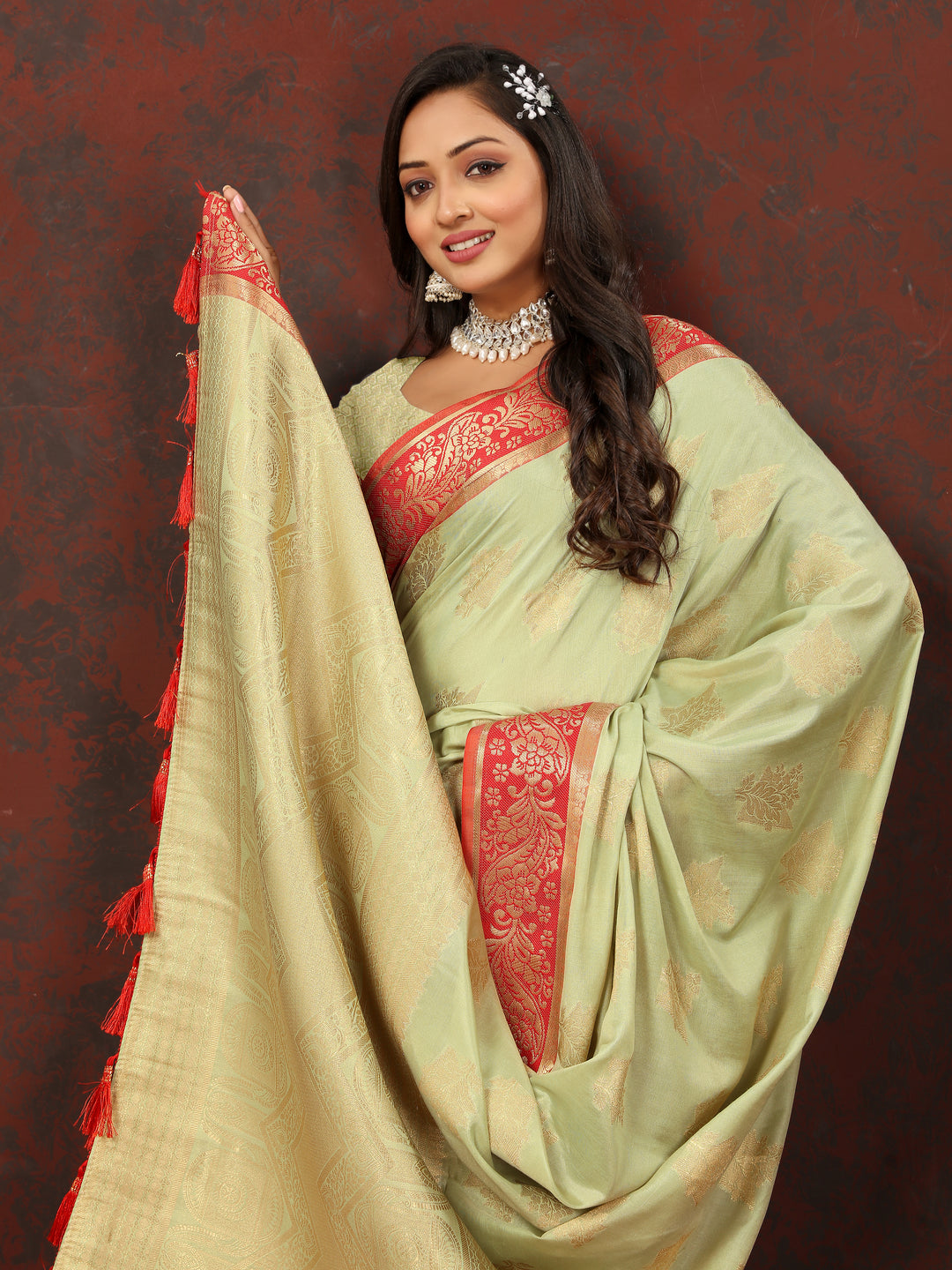 Classic pista green cotton saree with rich zari pallu, perfect for traditional celebrations.