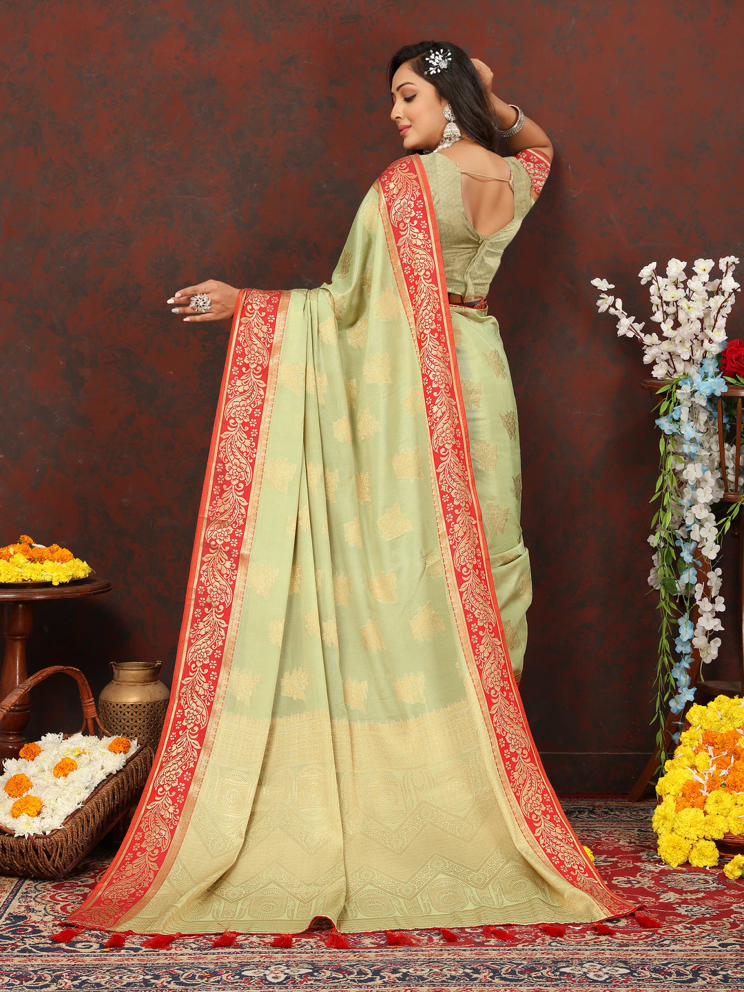 Pista green cotton saree featuring intricate zari pallu and silk blouse, ideal for Indian occasions.