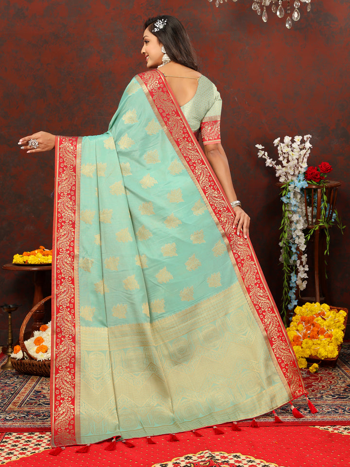 Elegant sky blue cotton saree with rich zari pallu, perfect for weddings and celebrations.